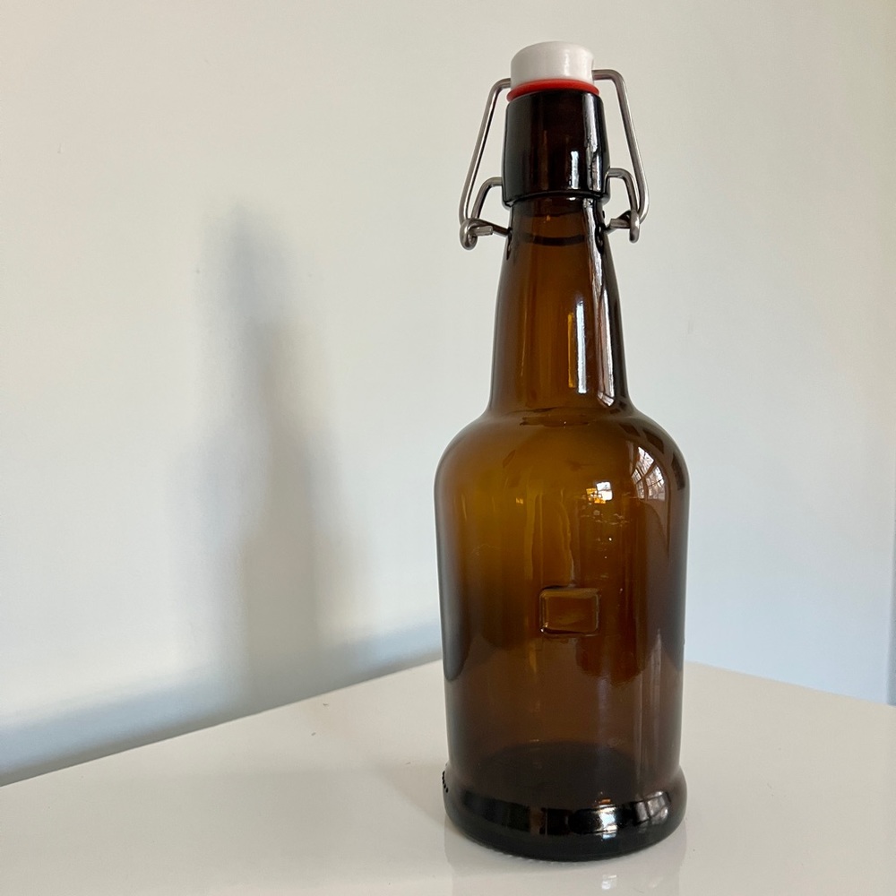 Vintage Amber Glass Bottle with Rubber and Metal Closure
